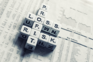 scrubble cubes spelling: profit, loss, risk